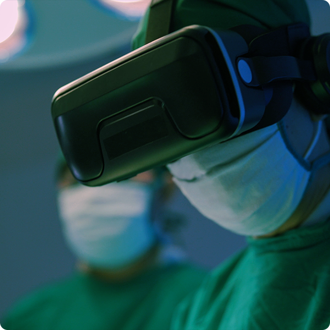 closeup of a physician wearing vr goggles for a procedure in an operating room